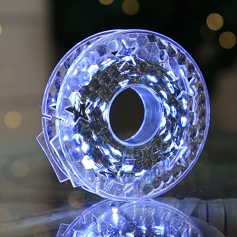 328-foot warm white LED Christmas light string with 1,000 bulbs, featuring invisible green wiring and multiple remote control modes. IP65 waterproof and cold-resistant, designed specifically for Christmas trees, gardens, and weddings.