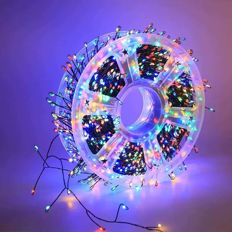 328-foot warm white LED Christmas light string with 1,000 bulbs, featuring invisible green wiring and multiple remote control modes. IP65 waterproof and cold-resistant, designed specifically for Christmas trees, gardens, and weddings.